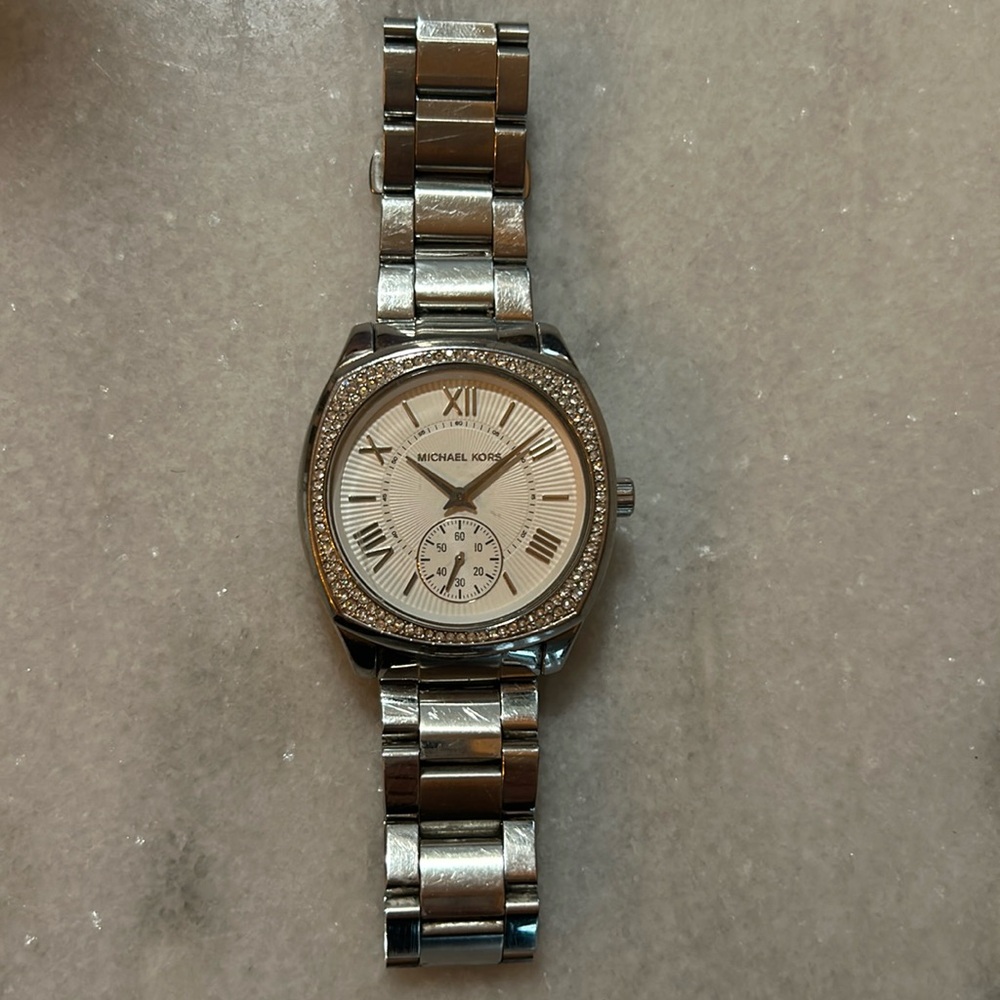 Stainless steel woman’s Michael Kors watch just needs battery